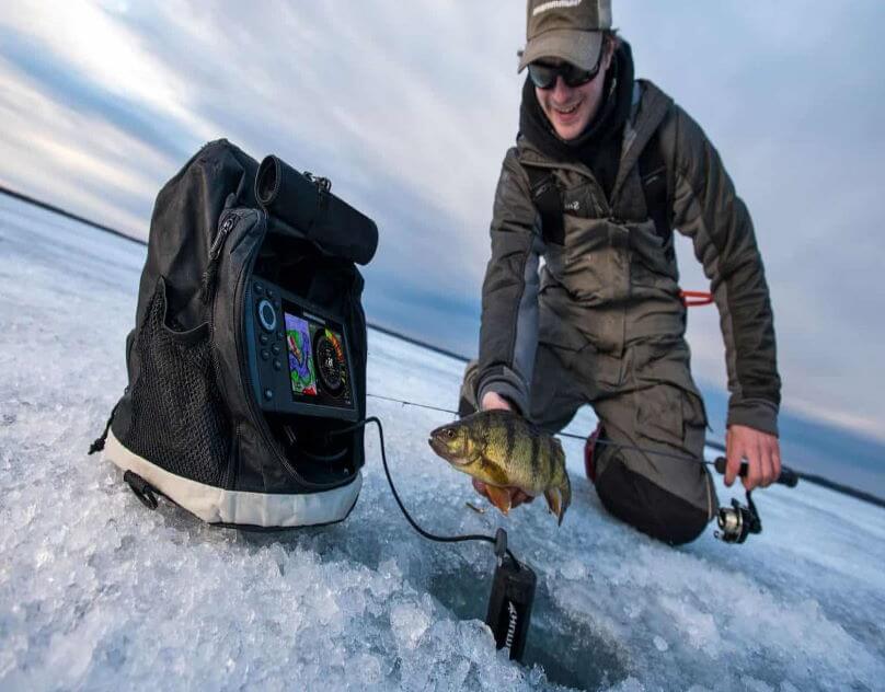 angler using the best ice fishing sonar